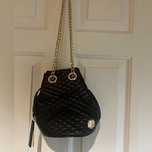 Vince Camuto mini bucket bag on a chain